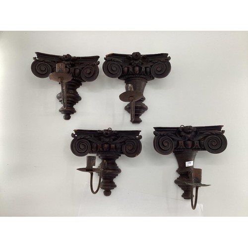 298 - Four oak sconces