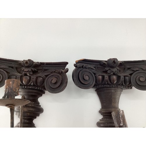 298 - Four oak sconces