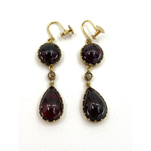 103 - A Pair of Georgian 9ct gold garnet and rose cut diamond drop earrings. Screw fittings suspended circ... 