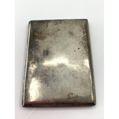 104 - A sterling silver card case by William Neale Chester 1906 65g