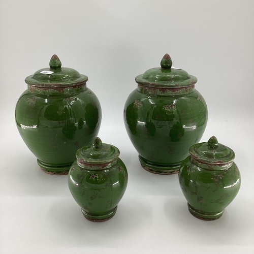 109 - Set of 4 decorative modern green ginger jars and covers, approx height of tallest 33cm; no sign of d... 