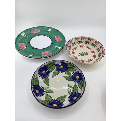 122 - A quantity of good decorative kitchen china to include large open platters, large open bowls, etc so... 