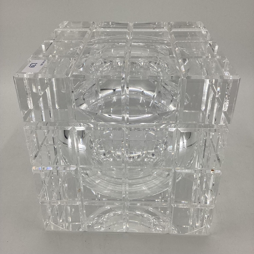 129 - A stylistic cubed ice bucket, with hinged lid, opening to reveal glass liner interior, retails for £... 