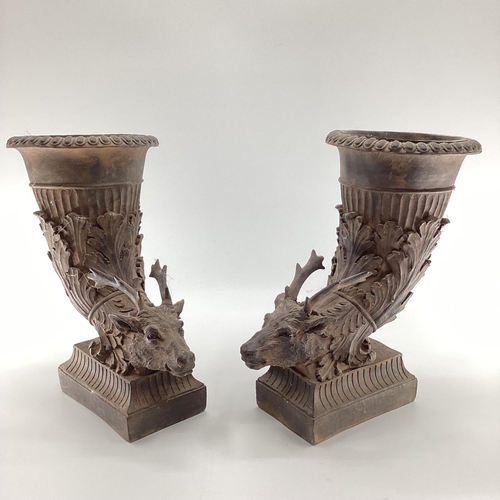 135 - Pair of modern planters/holders, modelled with  stag heads, some wear to interior,