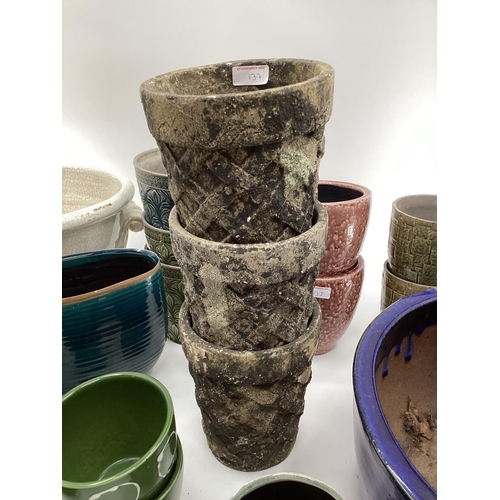 137 - A quantity of decorative flower pots, planters all modern, as found