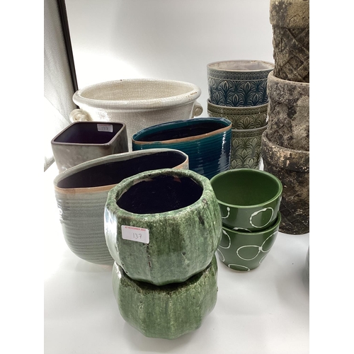 137 - A quantity of decorative flower pots, planters all modern, as found