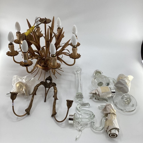 138 - A brass style 8 branch ceiling chandelier, a wall sconce,  and a glass chandelier, as found - some l... 