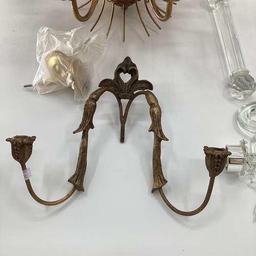 138 - A brass style 8 branch ceiling chandelier, a wall sconce,  and a glass chandelier, as found - some l... 