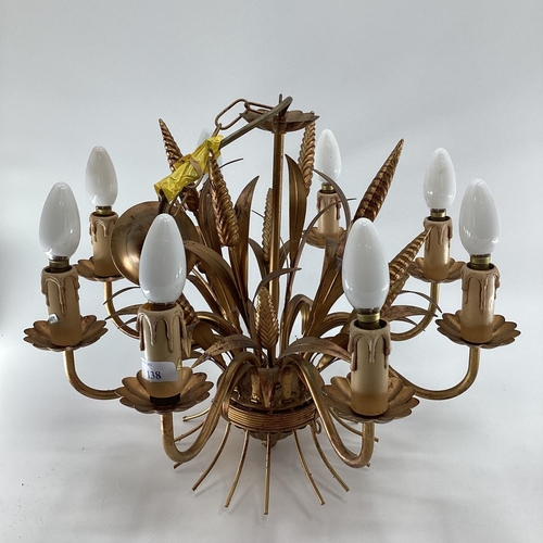 138 - A brass style 8 branch ceiling chandelier, a wall sconce,  and a glass chandelier, as found - some l... 