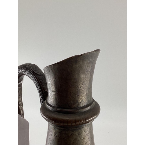 142 - A pair of bronze effect baluster vases, with cast dragon decoration, 25cm high, and a bronze ewer wi... 