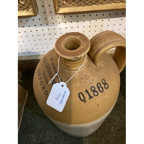 144 - Collection of C19th and early C20th slipware flagons, most with names to top to include Halls Oxford... 