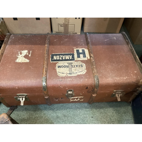 147 - Vintage suitcases and trunks, including Globe Trotters, all with much wear, buy as seen