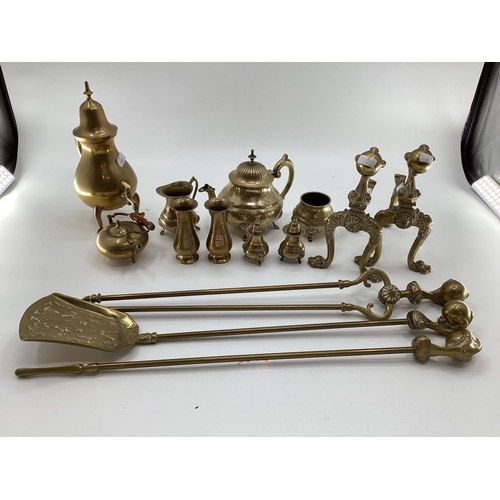 149 - A quantity of brassware's including brass fire irons, pots, small kettles, trinkets etc