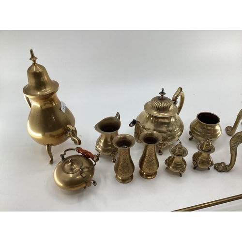 149 - A quantity of brassware's including brass fire irons, pots, small kettles, trinkets etc