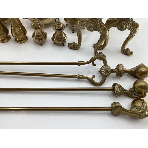 149 - A quantity of brassware's including brass fire irons, pots, small kettles, trinkets etc