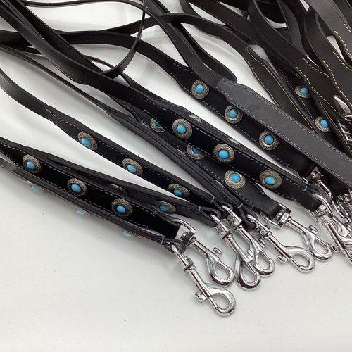 156 - A quantity of leather decorated dog leads etc