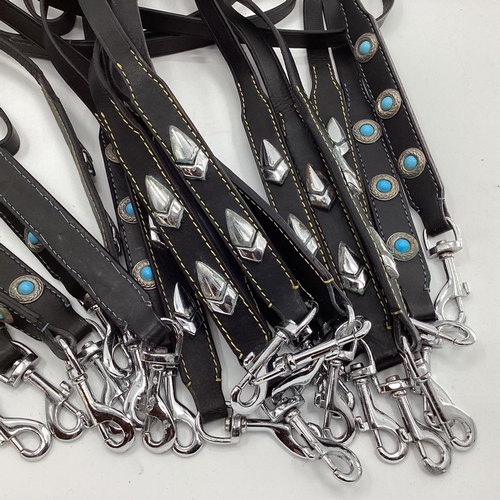 156 - A quantity of leather decorated dog leads etc