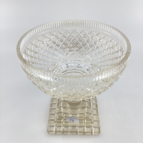 176 - C20th heavy cut glass fruit bowl standing on stepped foot