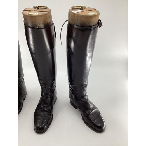 189 - Two pairs of black ladies leather hunting boots by Rowell and Sons, Melton Mowbray both with wooden ... 