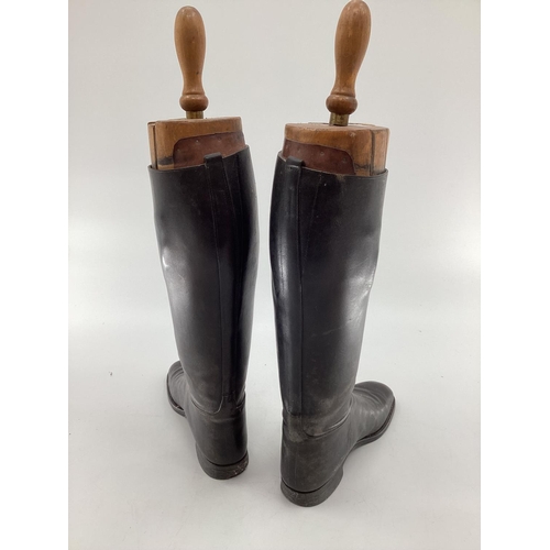 190 - Pair of black leather hunting boots by Rowell and Sons Melton Mowbray with wooden trees