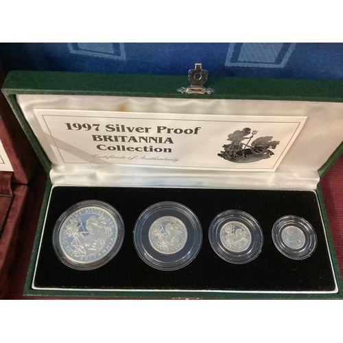 200 - A collection of silver and white metal commemorative  coins to include silver proof examples.