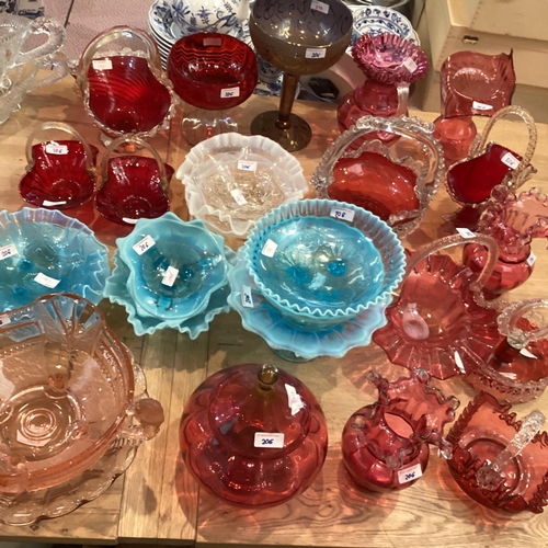 206 - A  quantity of coloured glass to include: pair of cranberry glass decorative baskets with rope twist... 