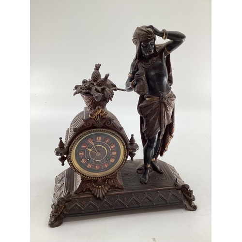 209 - A late C19th cast spelter figural mantle clock, cast figure of an Arab gentleman in the manner of of... 