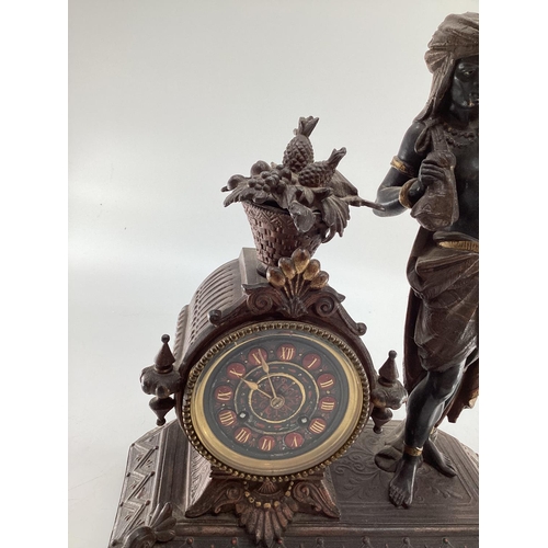 209 - A late C19th cast spelter figural mantle clock, cast figure of an Arab gentleman in the manner of of... 