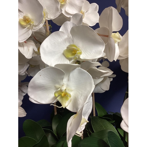 216 - A large impressive faux flowers decorative statement piece, of white orchid arrangements,  in large ... 