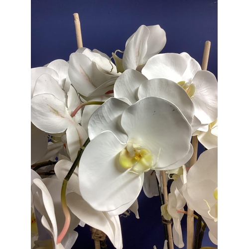 216 - A large impressive faux flowers decorative statement piece, of white orchid arrangements,  in large ... 