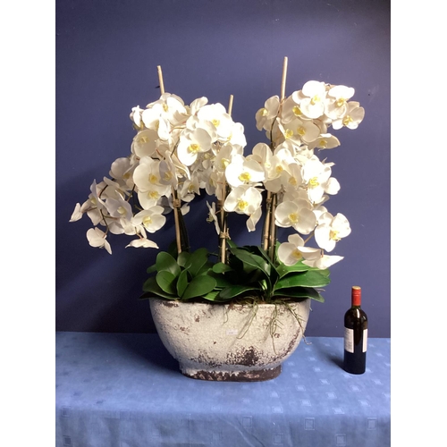 216 - A large impressive faux flowers decorative statement piece, of white orchid arrangements,  in large ... 