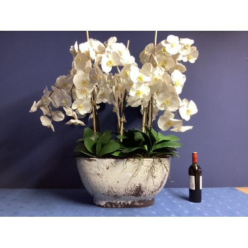 216 - A large impressive faux flowers decorative statement piece, of white orchid arrangements,  in large ... 