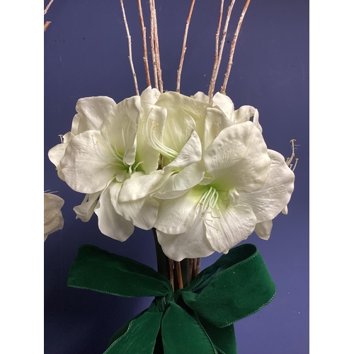 220 - Three faux flower arrangements,  white amaryllis, in contemporary  circular mirrored planters, set w... 