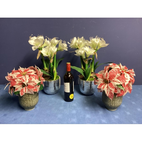 221 - Two pairs of  faux flowers arrangements: a  pair of red and white variegated Poinsettia, in mottled ... 