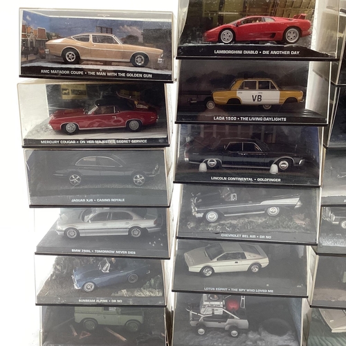 227 - A collection of modern collectable toy cars to include many James Bond examples