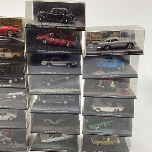 227 - A collection of modern collectable toy cars to include many James Bond examples