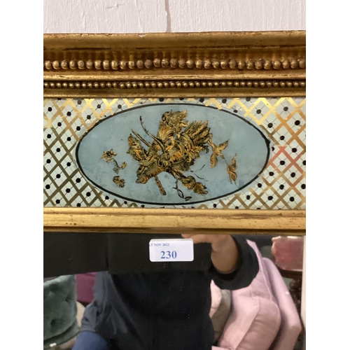 230 - A Georgian gilt pier mirror, rectangular plate with twin column support frame, topped by inset ename... 