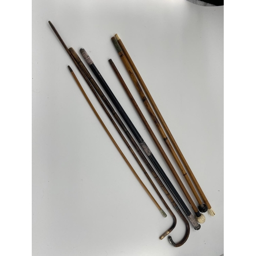 232 - A quantity of walking canes and swagger sticks