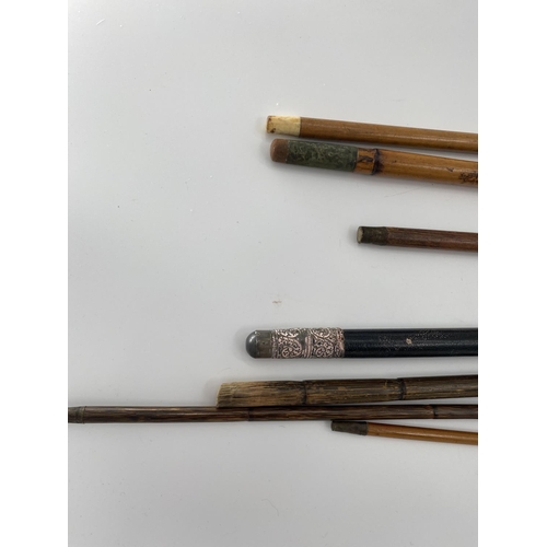 232 - A quantity of walking canes and swagger sticks