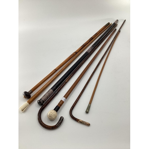 232 - A quantity of walking canes and swagger sticks