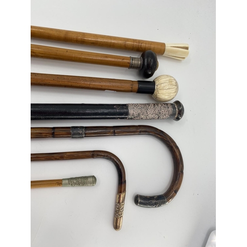 232 - A quantity of walking canes and swagger sticks