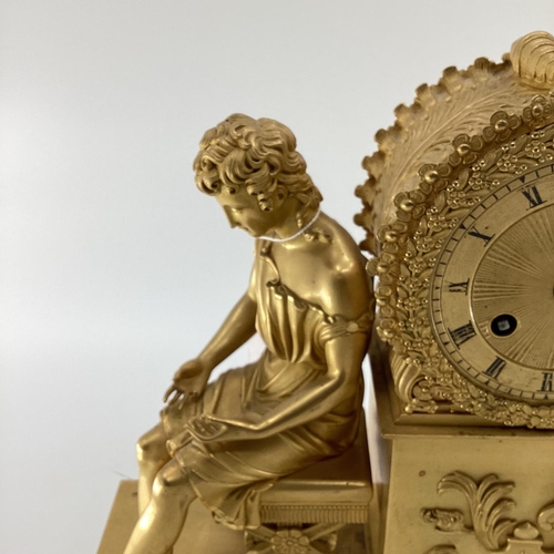 234 - Gilded French mantle clock, flanked by figures of Grecian women sat on Regency style cross stretcher... 