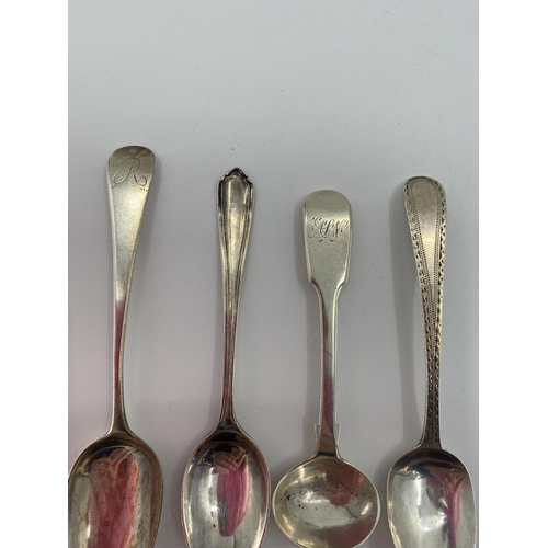 24 - A collection of sterling silver tea spoons and a set of four Georgian mustard spoons, 142g AND A col... 