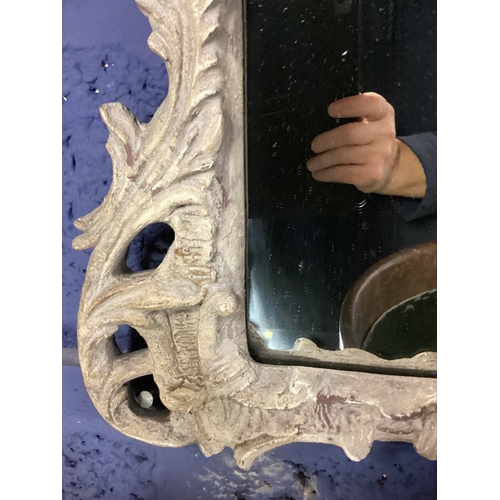 248 - An OKA carved wooden overmantle mirror, three arched plates with carved pierced frame originally gil... 