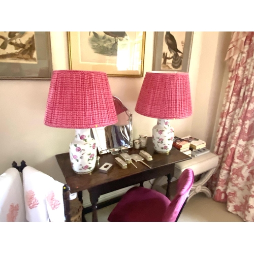 252 - Pair of china lamps, decorated pink flowers, with pink POOKY silk pleated lampshades, lamps 36cmH