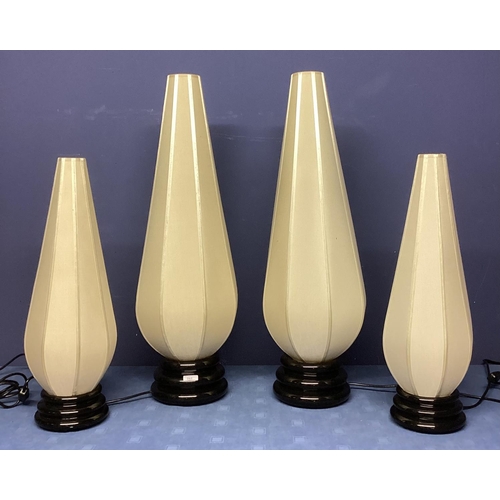 261 - Four similar small black lamps, with modern tall conical style cream shades