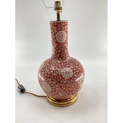 265 - Large Chinese style red/orange and white coloured lamp, 38cmH (lamp only) and silk pleated lamp shad... 