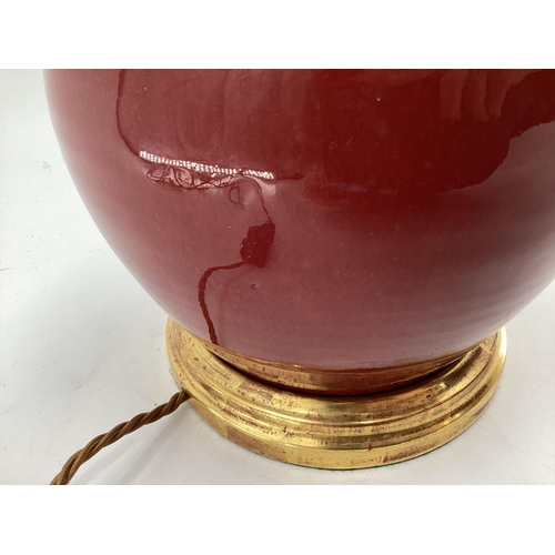 266 - Chinese style red colour lamp base, 40cmH, and silk pleated shade