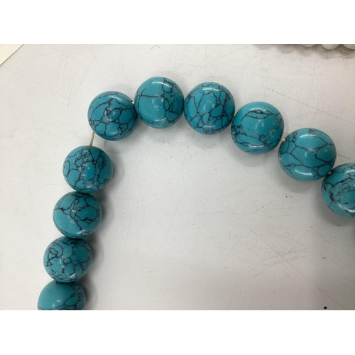 269 - A large faux turquoise bead necklace