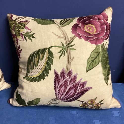 270 - A set of four bespoke good silk and velvet cushions, decorated cream ground and purple and green fol... 